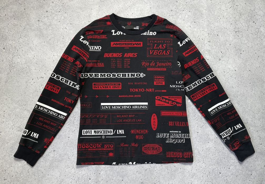 Moschino all discount over print sweatshirt