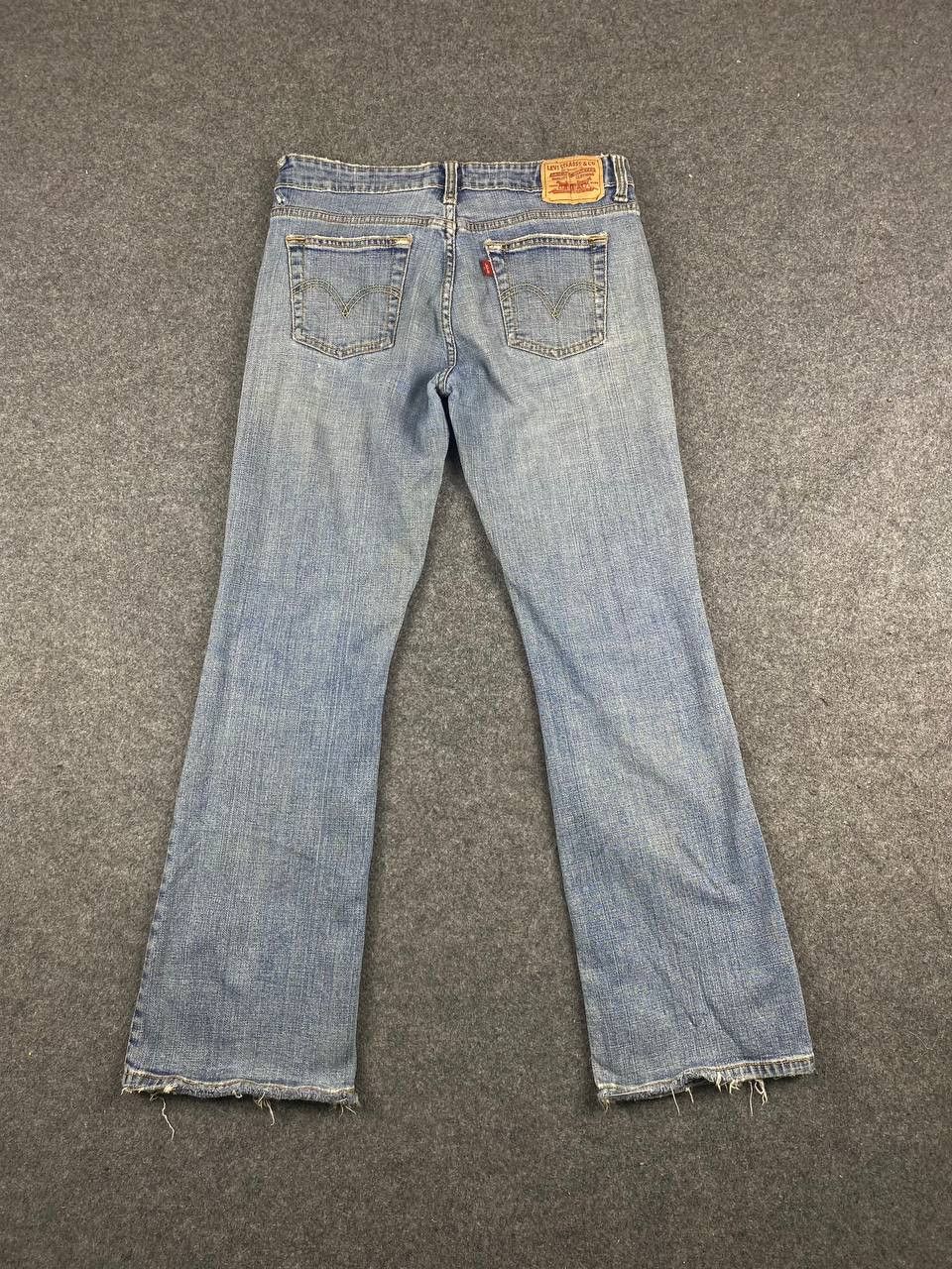 image of Vintage Levis 515 Bootcut Flare Distressed Denim in Light Blue, Women's (Size 32)