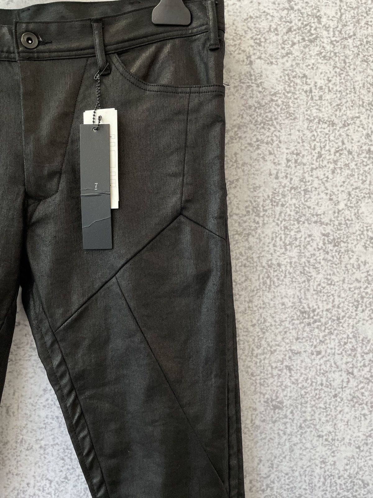 Julius Coated Stretch Trousers | Grailed