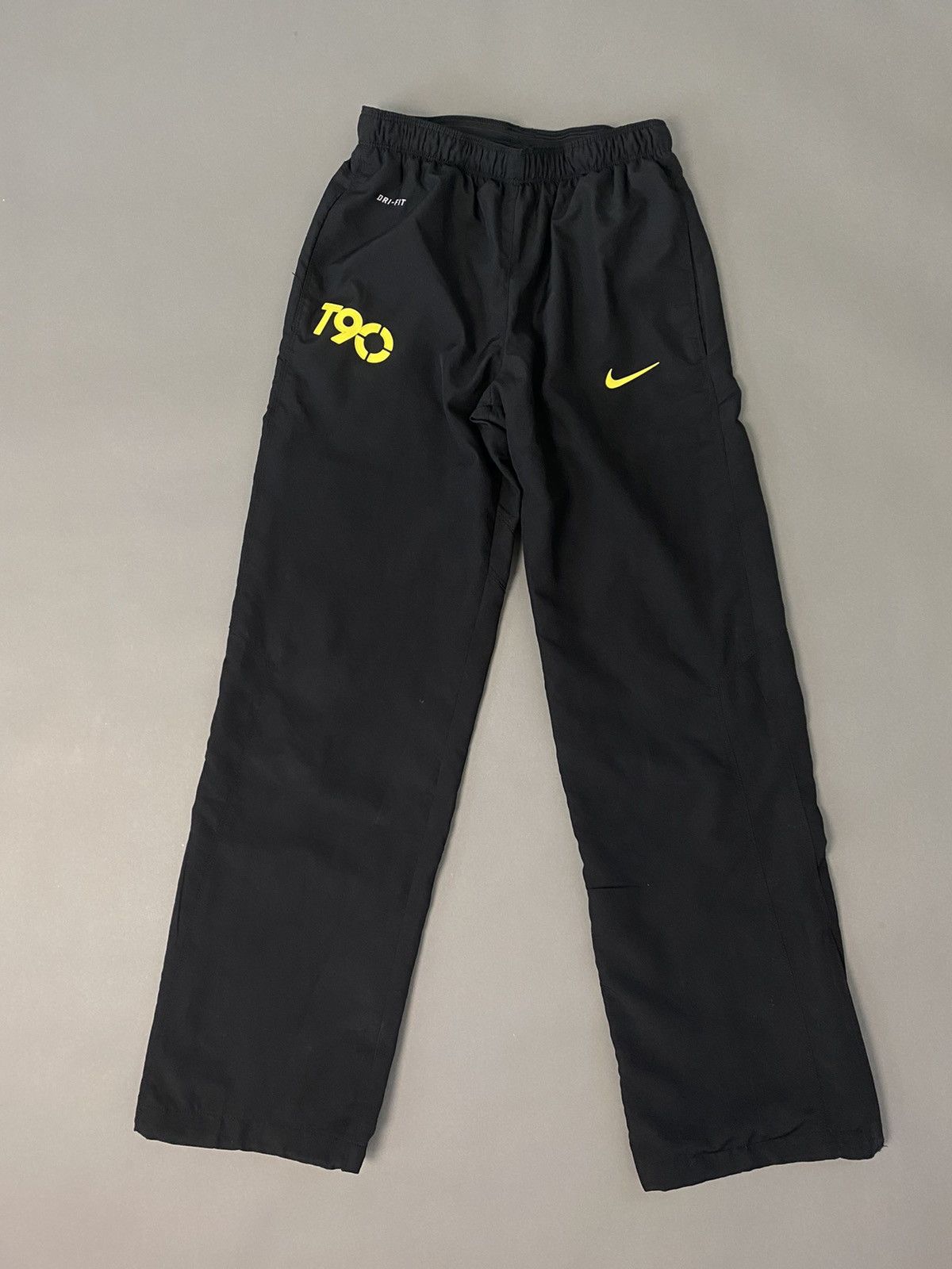 Nike t90 track pants best sale