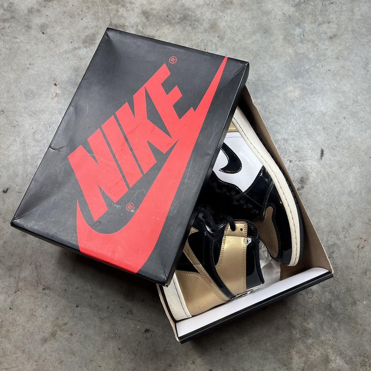 image of Jordan Nike Jordan 1 Retro High Nrg Patent Gold Toe Shoes in Black, Men's (Size 11)