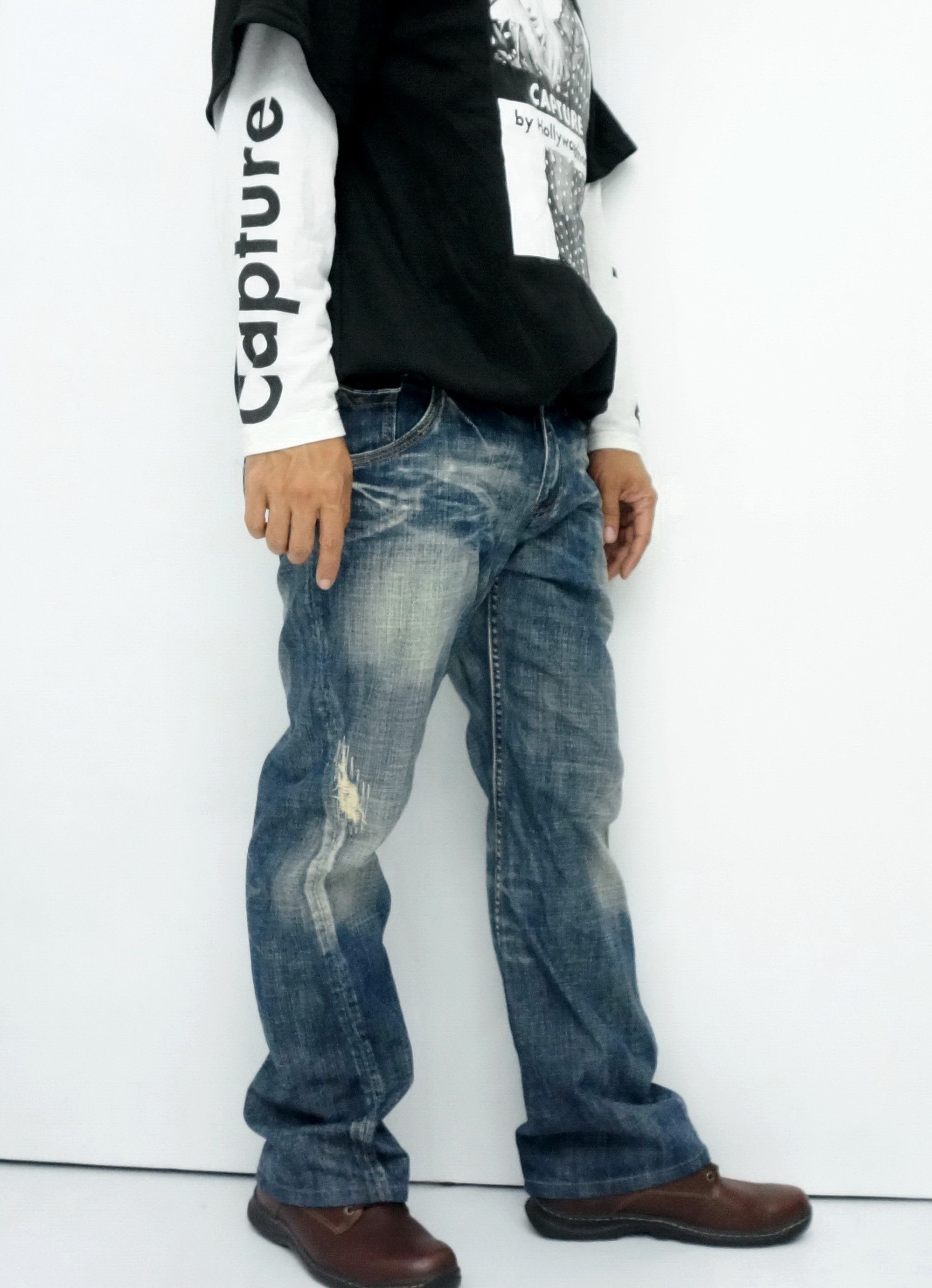 image of Hysteric Glamour x Issey Miyake Tete Homme Twisted Seam Flared Lowrise Jeans in Dark Blue Denim (Si
