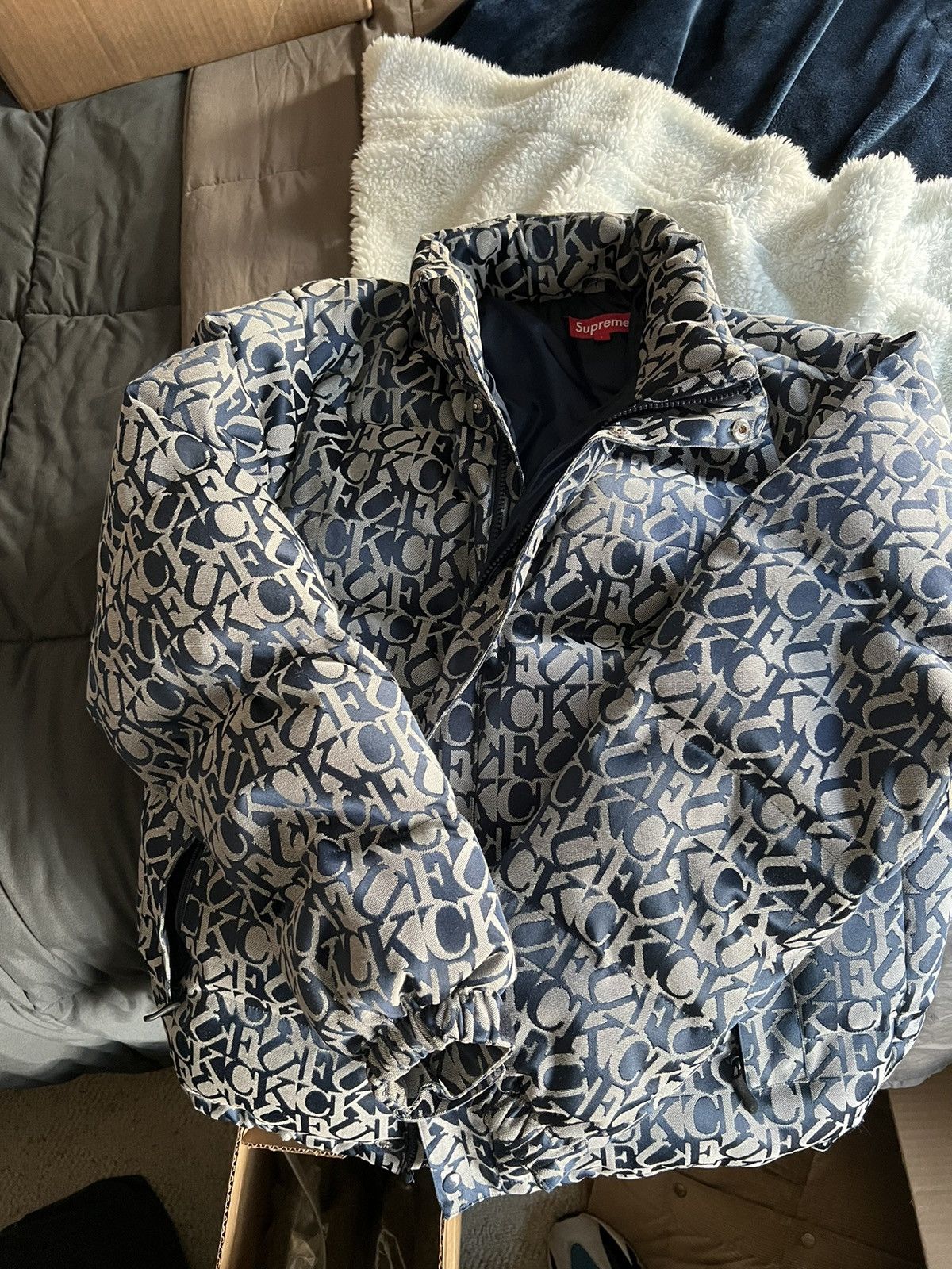image of Supreme Fuck Jacquard Puffy Jacket in Navy, Men's (Size Large)