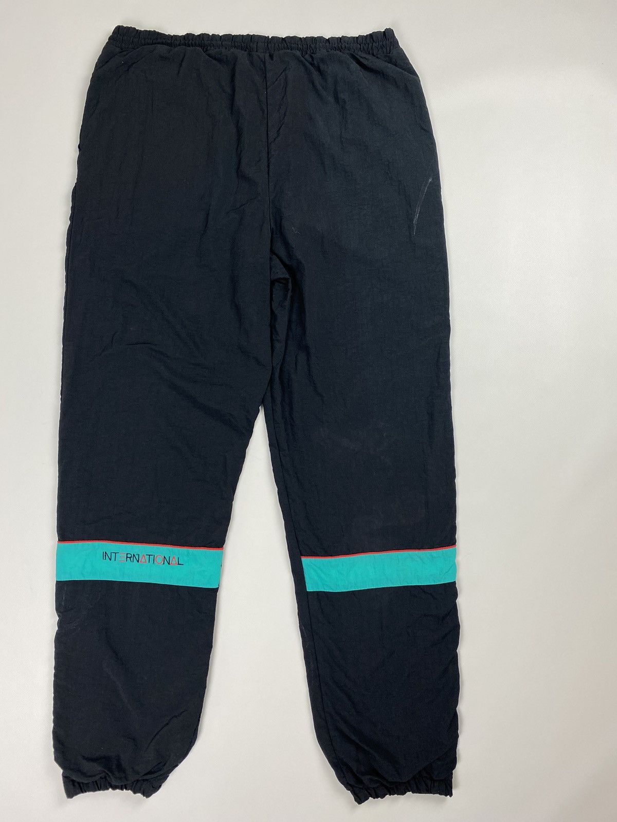 Puma × Vintage Puma International vintage men’s nylon track pants Size US 32 / EU 48 - 15 Thumbnail