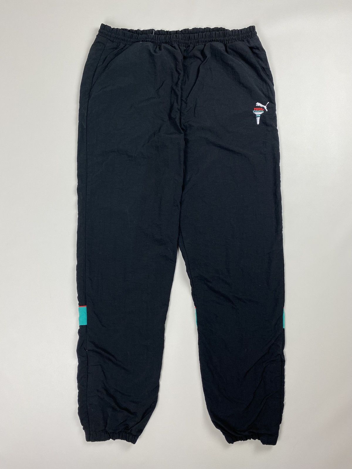 Puma × Vintage Puma International vintage men’s nylon track pants Size US 32 / EU 48 - 1 Thumbnail