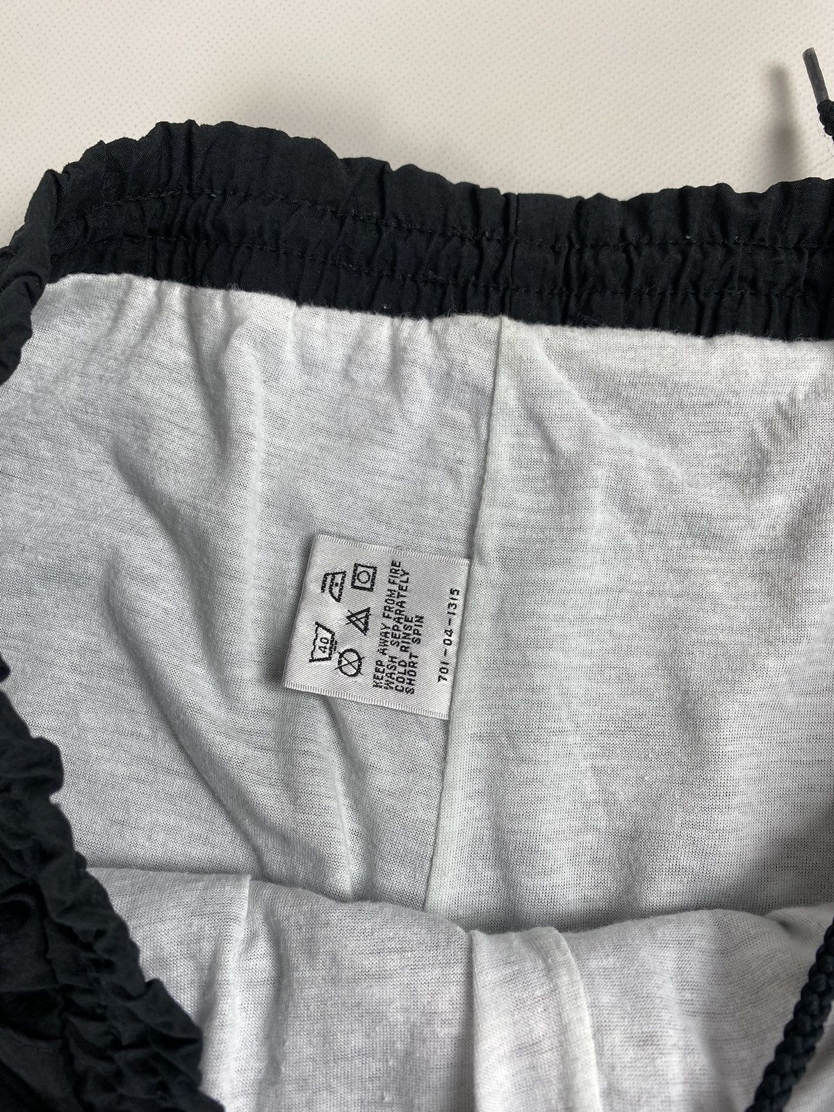 Puma × Vintage Puma International vintage men’s nylon track pants Size US 32 / EU 48 - 12 Thumbnail