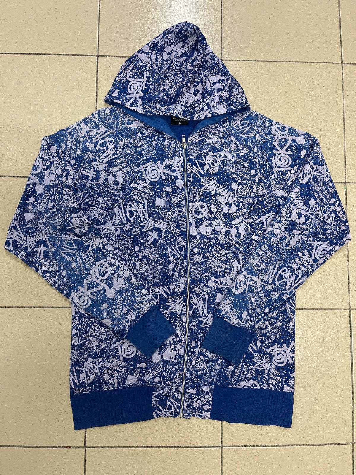 image of Vintage Distressed Stussy World Tour Graffiti Very in Blue, Men's (Size Medium)