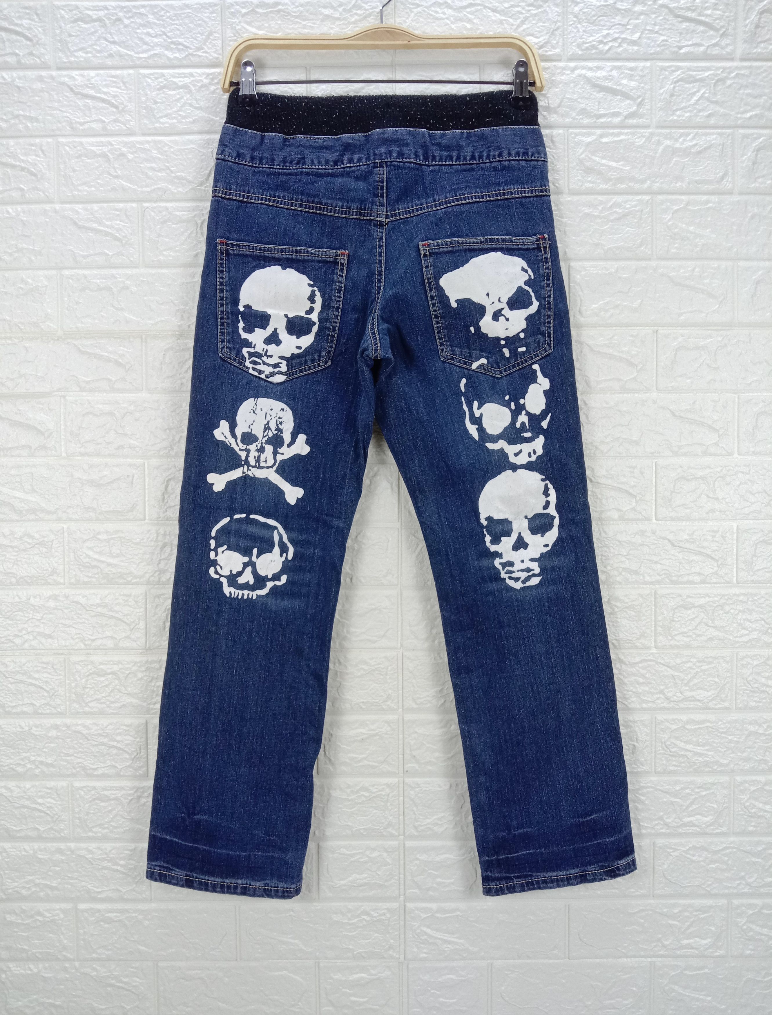 image of Beauty Beast x Skulls Vintage Japanese Skulls Printed Jeans in Blue, Women's (Size 28)
