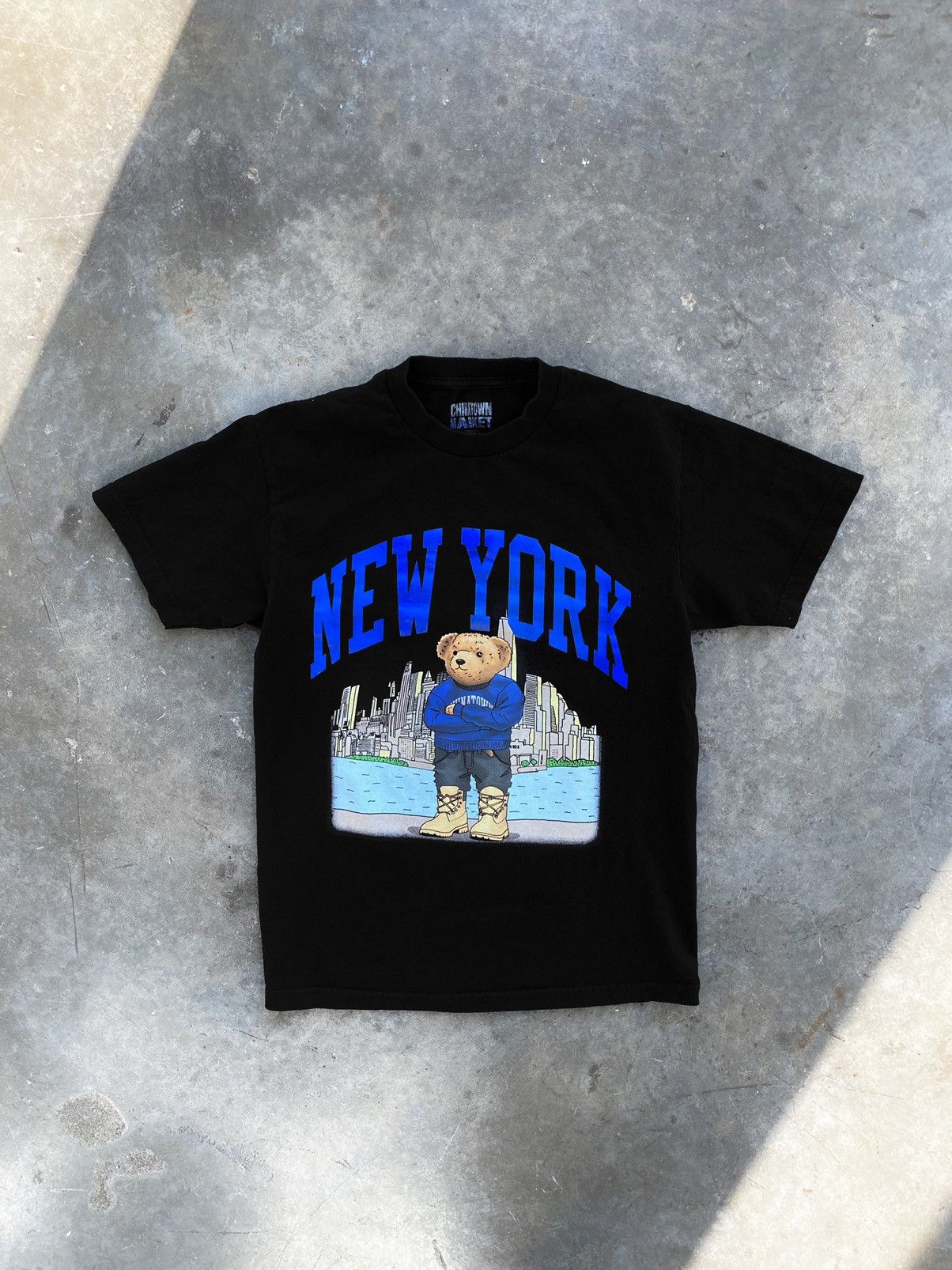 image of Chinatown Market New York Polo Bear Arc Logo Tee Black, Men's (Size Medium)