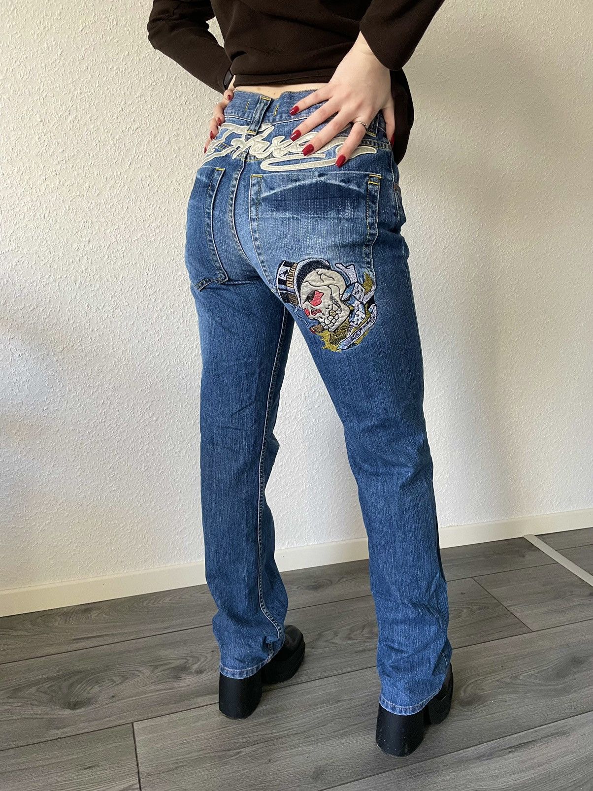 Ed Hardy's vintage women selling jeans