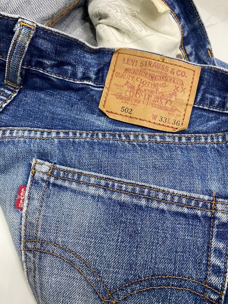 Levi's VINTAGE LEVIS BIG E 502 SELVEDGE DISTRESSED DENIM JEANS Size US 33 - 11 Thumbnail