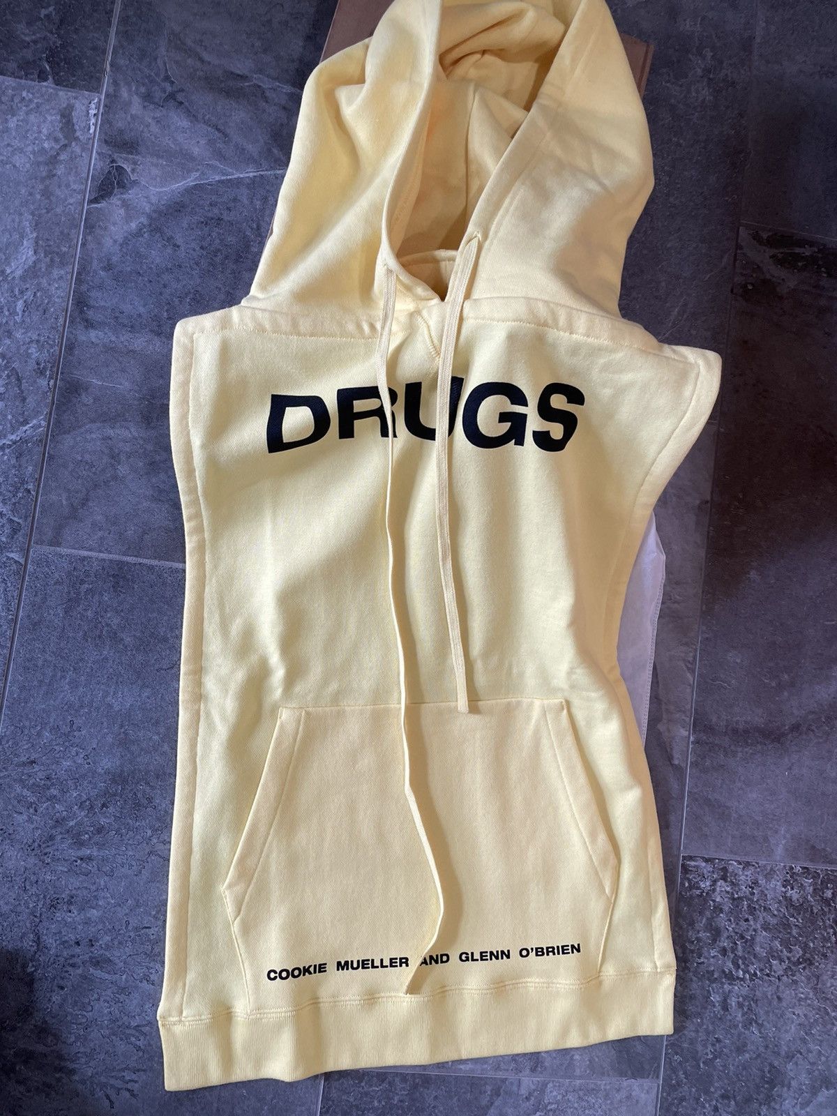 image of Hype Raf Simons Drugs Logo Sleeveless Hoodie Bib Yellow Os, Men's (Size Large)