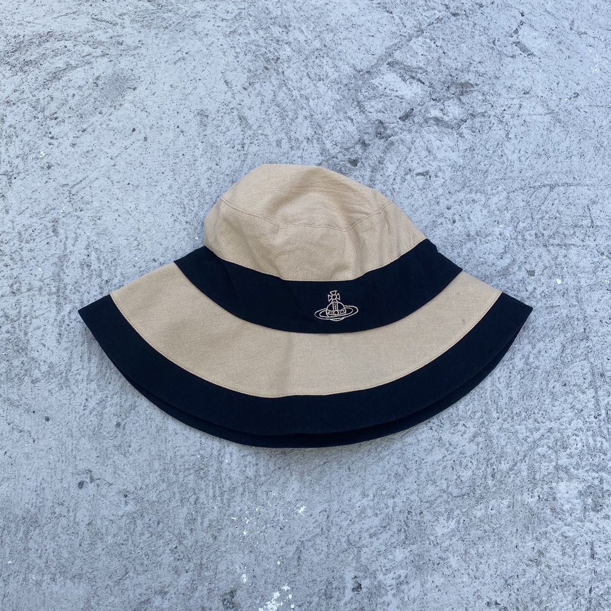 Vivienne Westwood bucket straw hat for $80 hitting the floor! Check it out  in real life 😉 open today 10-6 🛍️