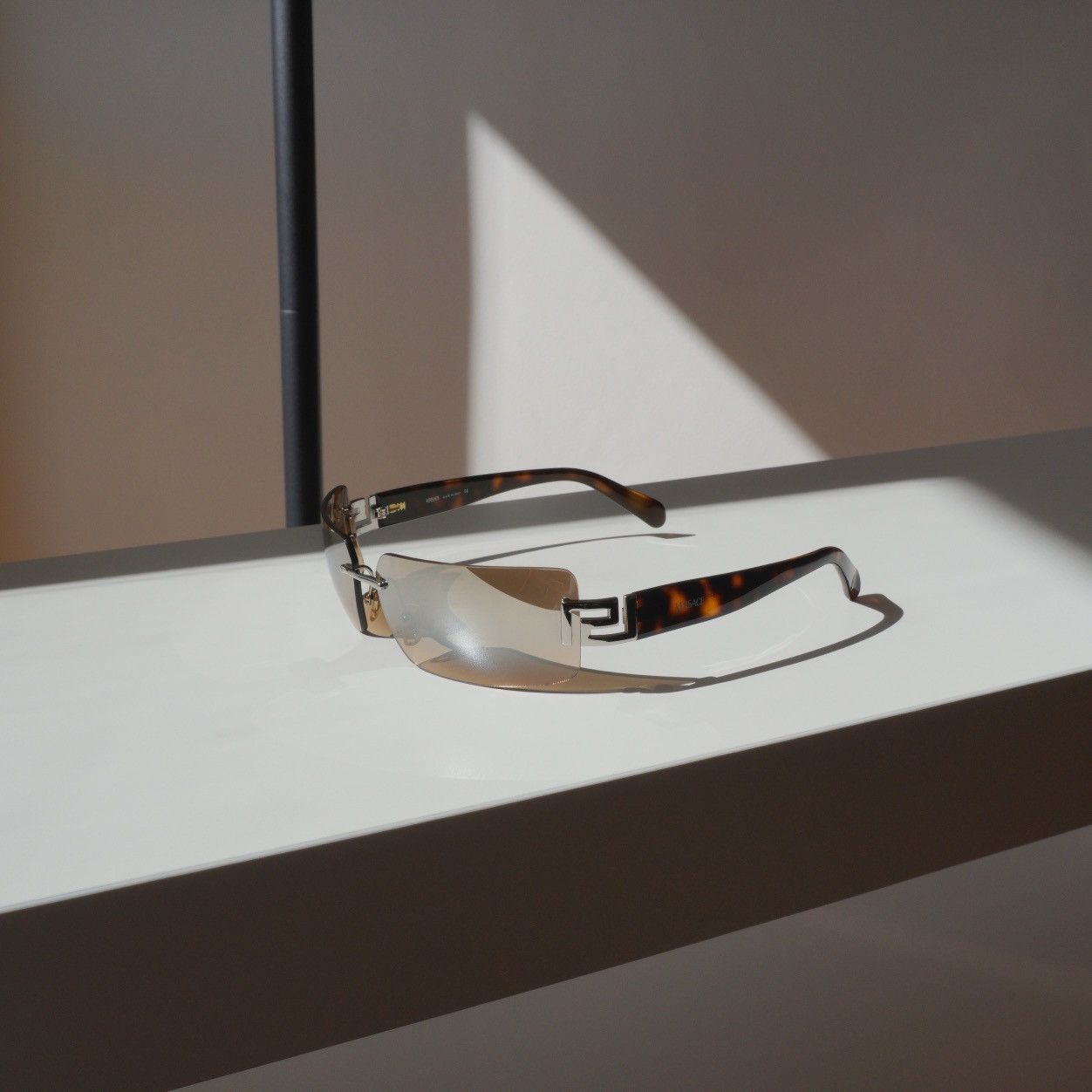 image of Vintage Versace Silver Logo Brown Sunglasses, Women's