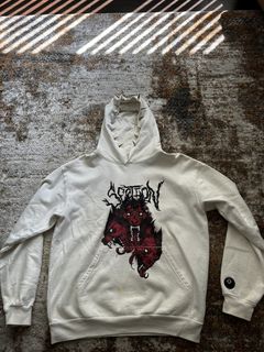 Hoodie with metal outlet spikes on hood