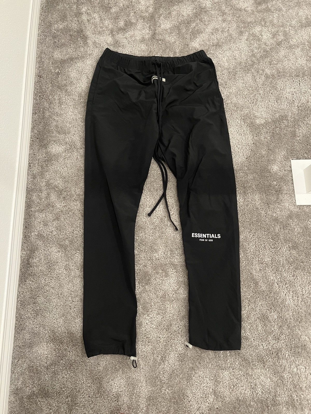 Fear of God Essentials fear of god jogger windbreaker pants | Grailed