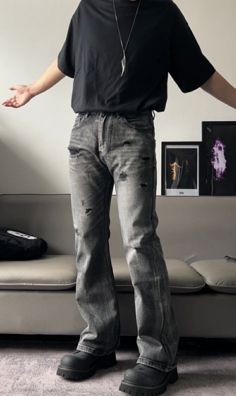 faded damaged ripped flared pants