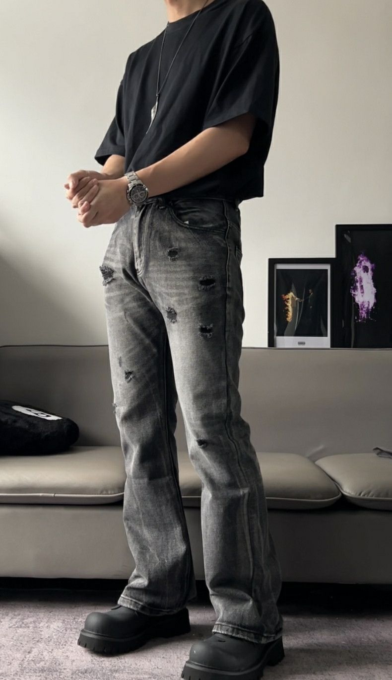 faded damaged ripped flared pants