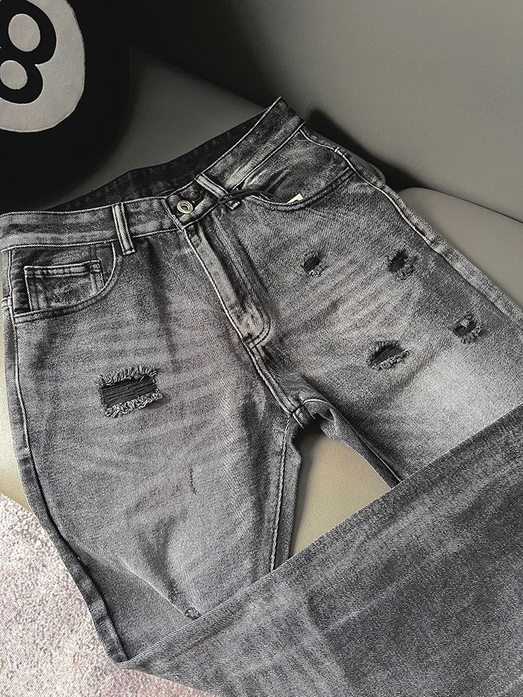 faded damaged ripped flared pants