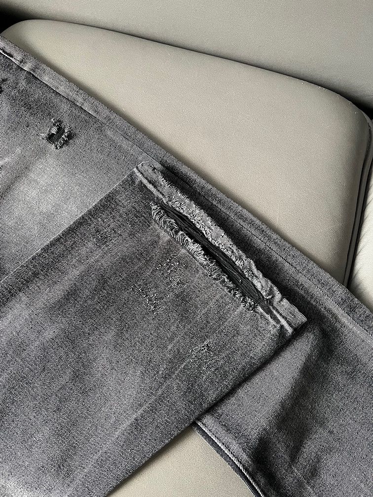 faded damaged ripped flared pants