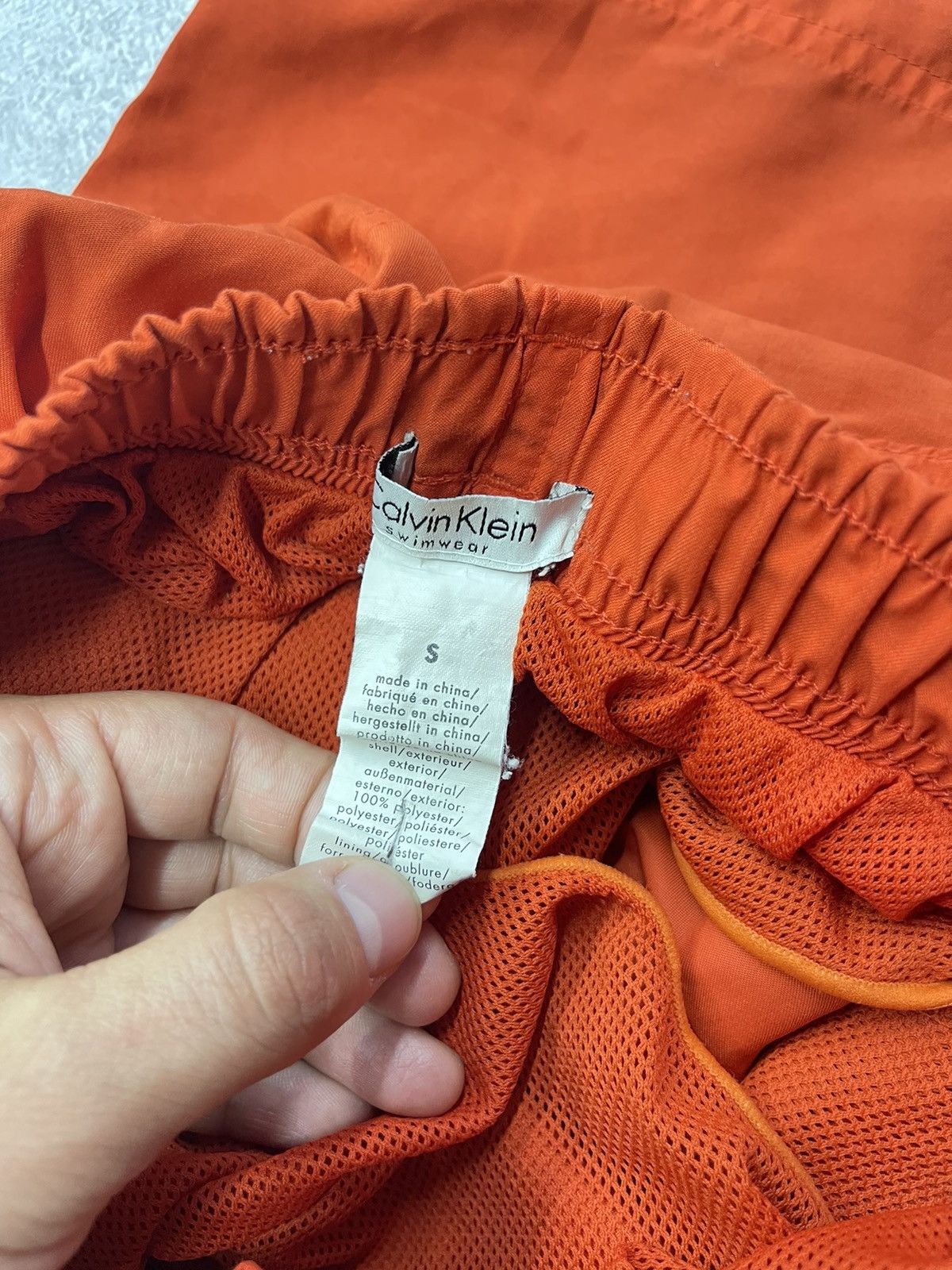 Orange calvin klein swim shorts best sale