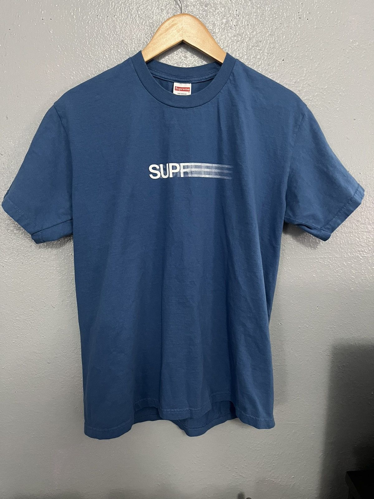 Supreme Supreme motion logo Tee Faded Blue | Grailed