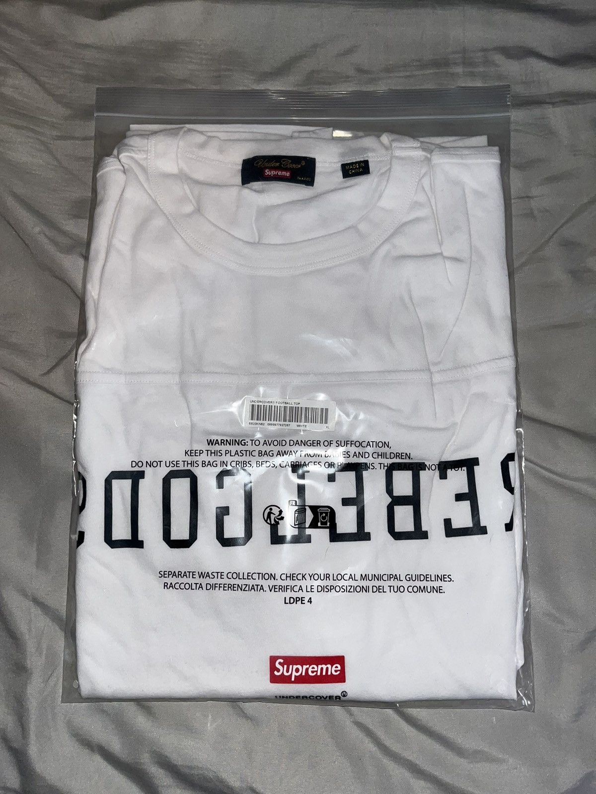 Supreme Supreme/Undercover Rebelgods football top XL DS | Grailed