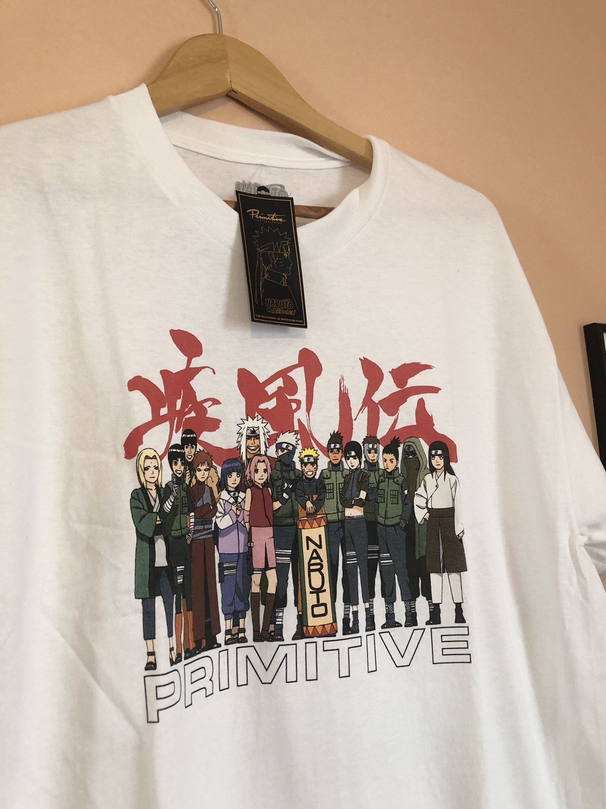 image of Naruto Shippuden X Primitive Village Leaf Ninja T-Shirt in White, Men's (Size Large)