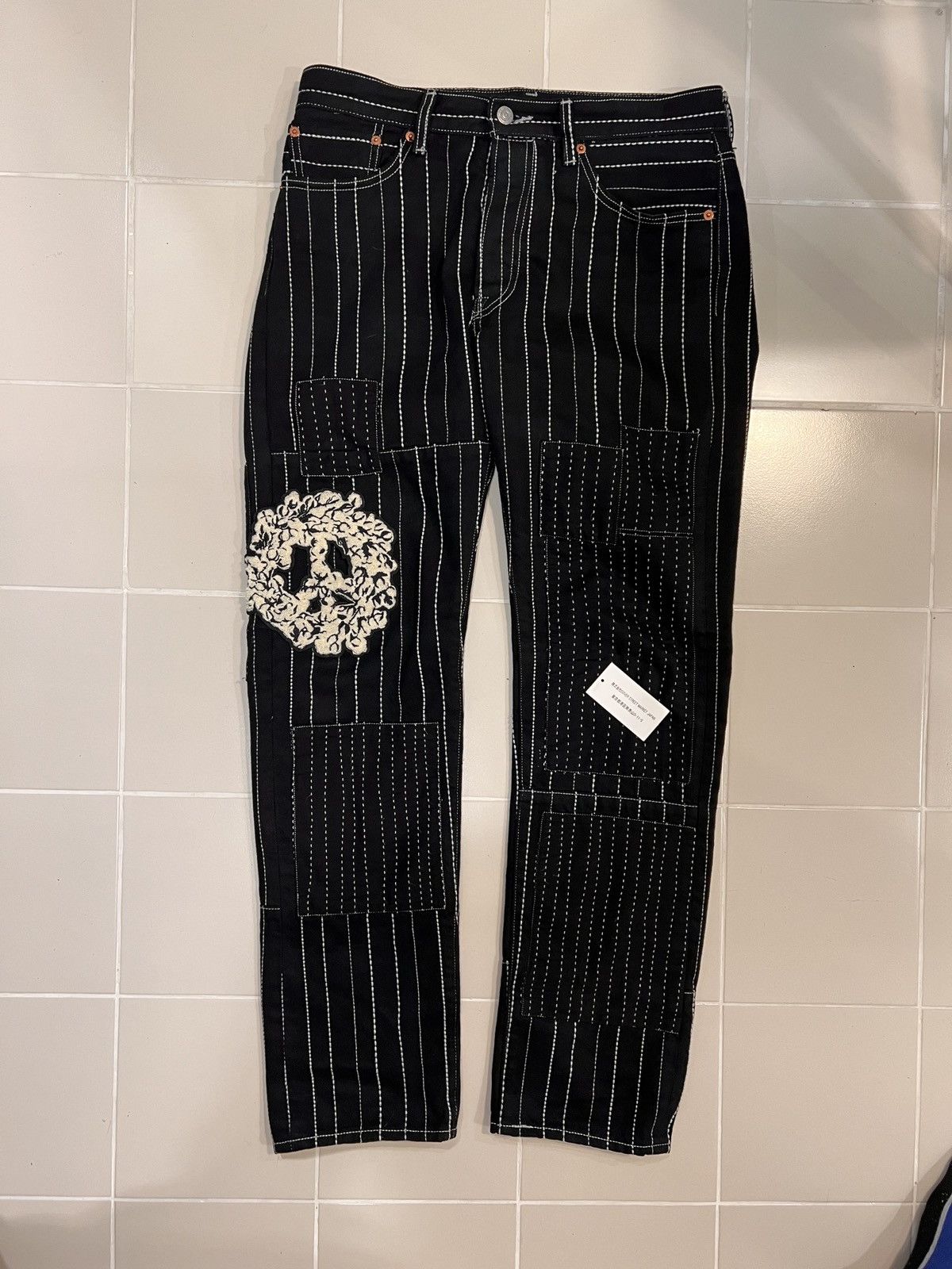image of Levi's Denim Tears Peace Patchwork 501 in Black, Men's (Size 32)