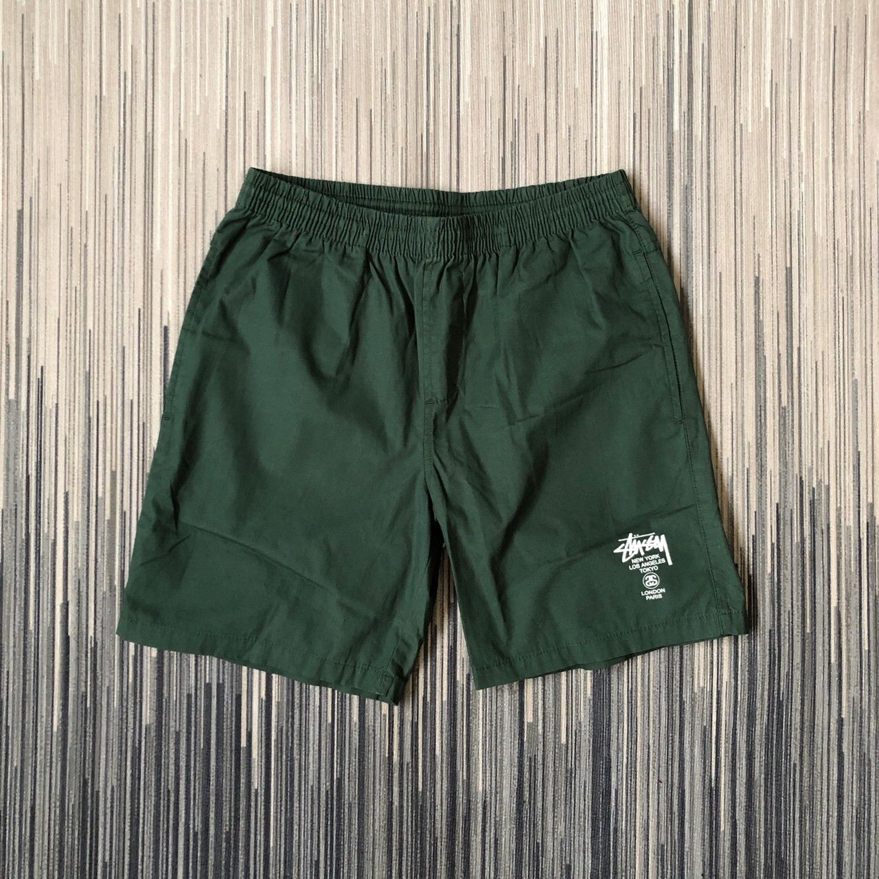 image of Stussy World Tour Shorts in Green, Men's (Size 28)