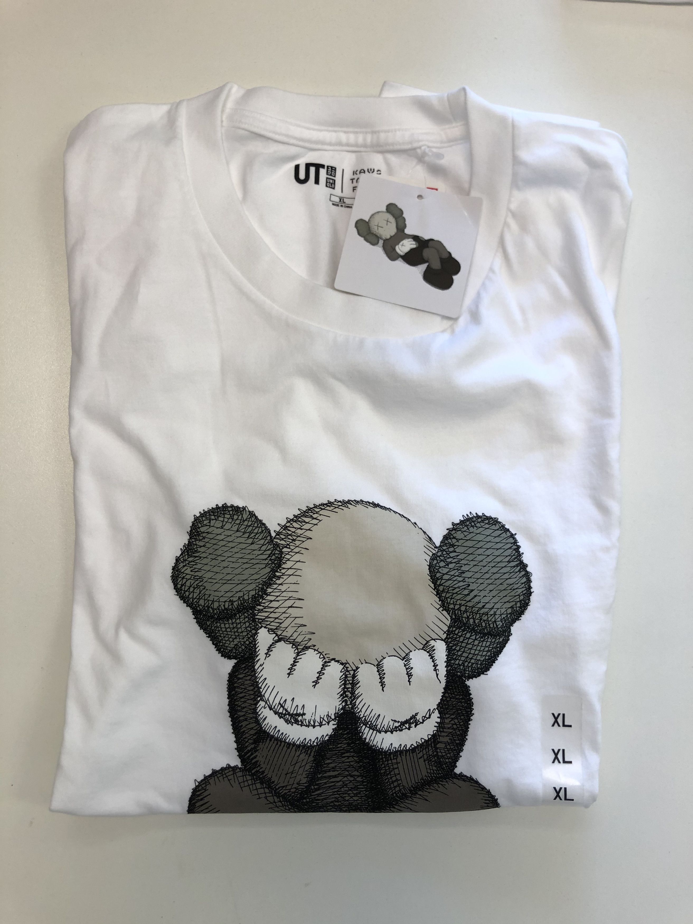 KAWS x Uniqlo Tokyo First Tee SS21 Seperated