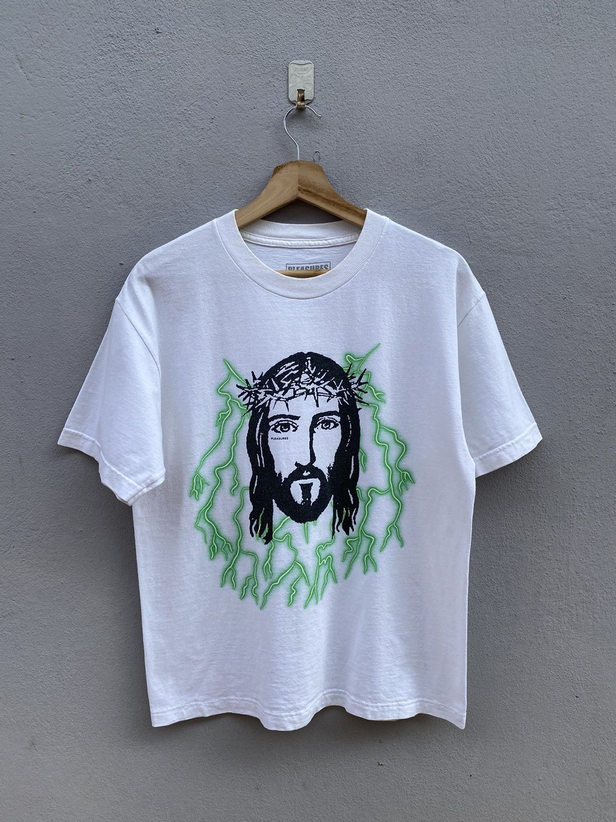 PLEASURES “Jesus” Tee