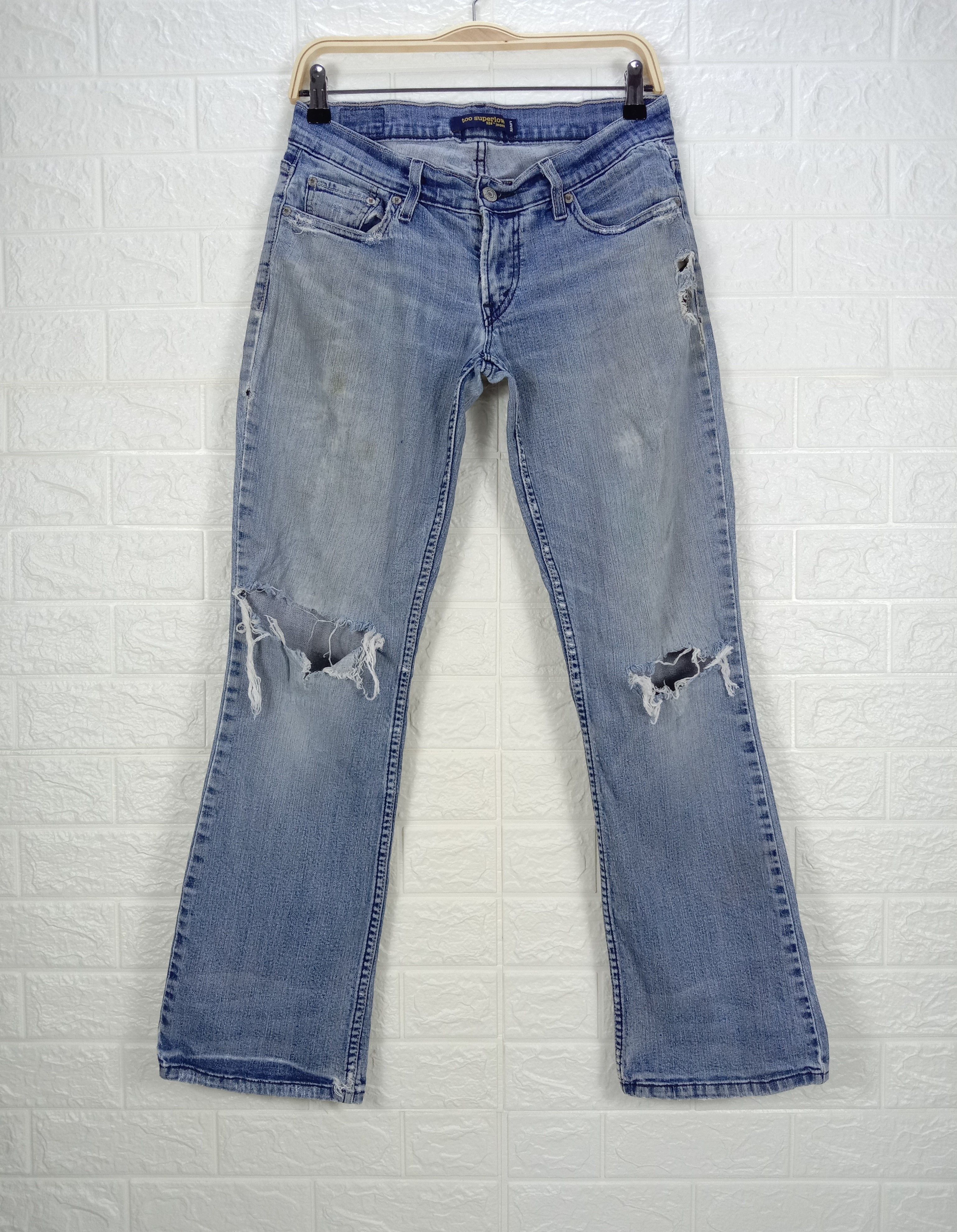 image of Distressed Denim x Levis Vintage Levi's 524 Flare Jeans Faded Blue Ripped Denim, Women's (Size 28)