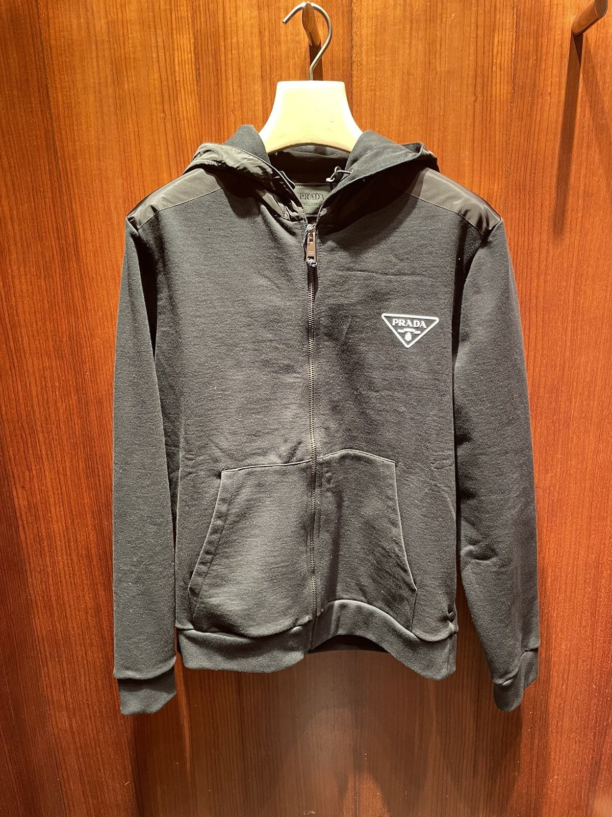 image of Prada Zip Up Chest Logo Hoodie in Black, Men's (Size XL)