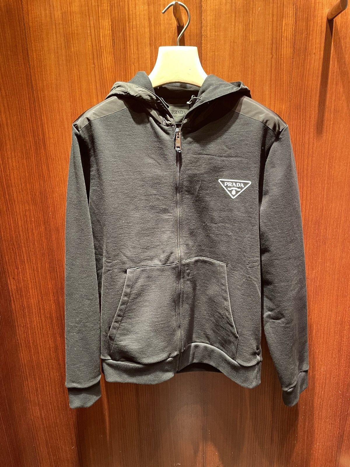 image of Prada Zip Up Chest Logo Hoodie in Black, Men's (Size XS)