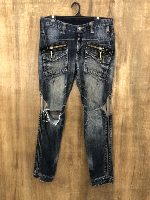 MULTIPOCKET DISTRESSED DENIM