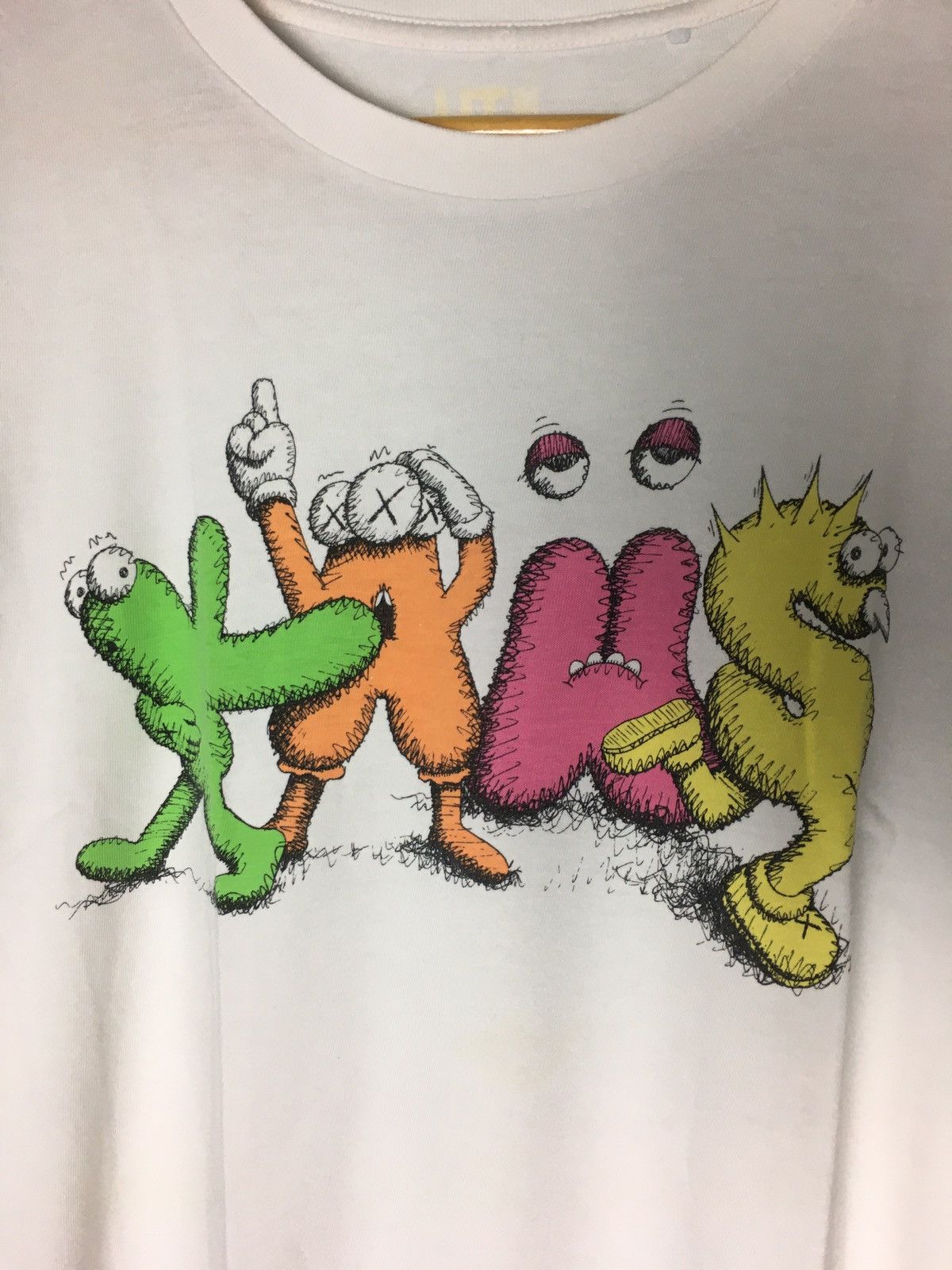 Kaws × Original Fake × Uniqlo Kaws Spell Out Multicolor Tee Shirt Uniqlo Size US M / EU 48-50 / 2 - 3 Thumbnail