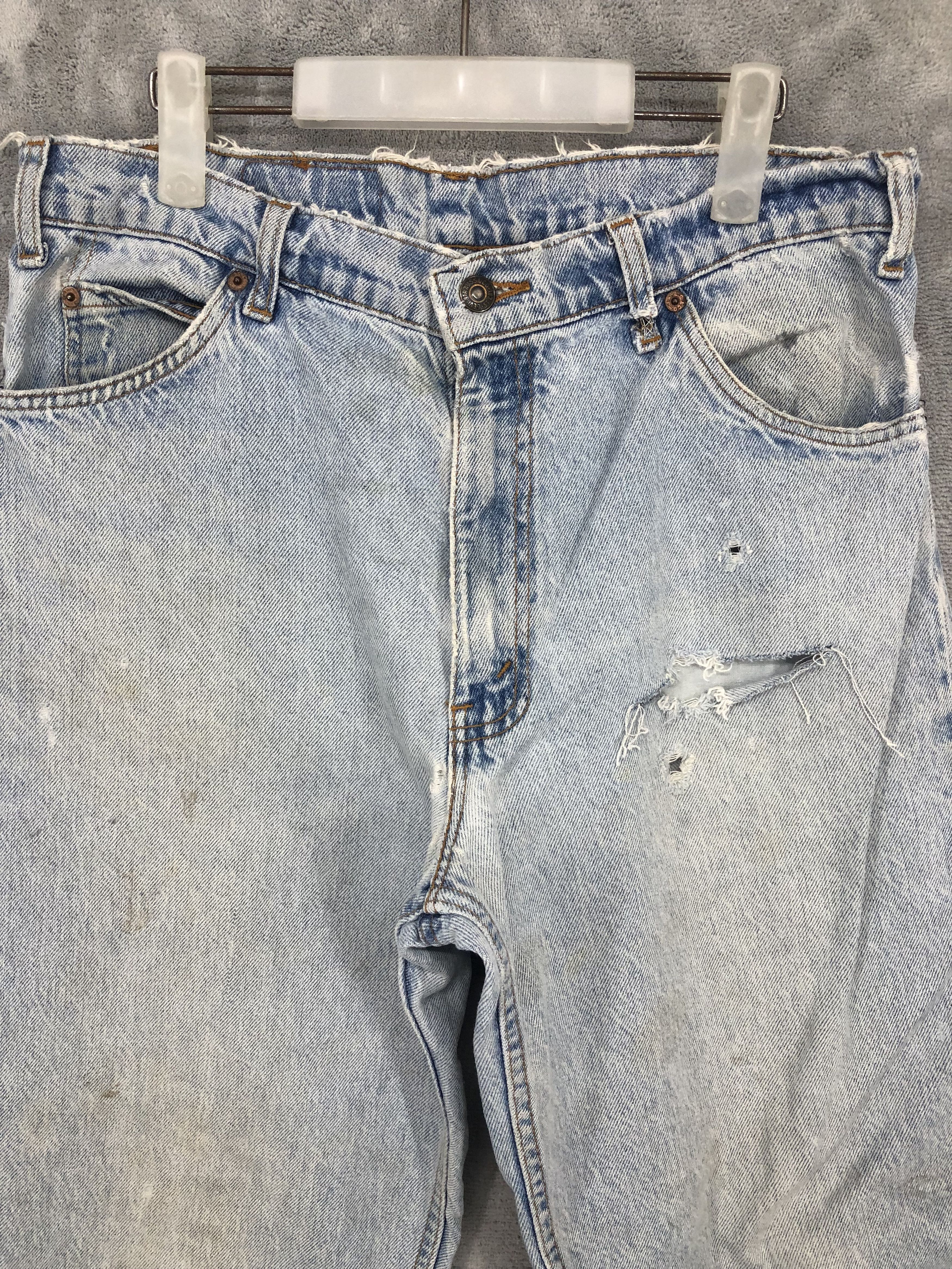 Vintage levis 550 Orange Tab Jeans Distressed Denim