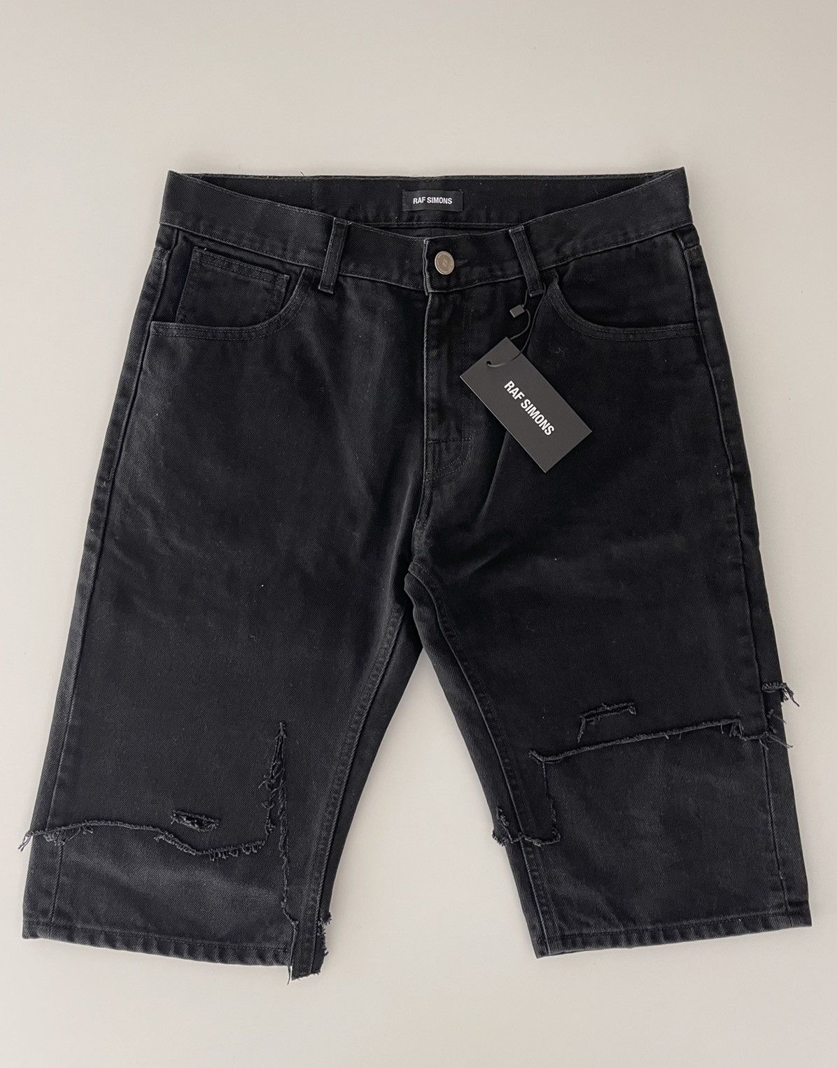 image of Raf Simons Distressed Double Layer Denim Shorts in Black, Men's (Size 31)