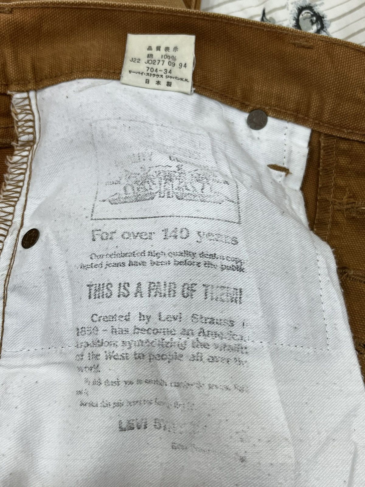 Levi's (Hh). VINTAGE LEVIS BIG E BUCKLE BACK LOT 704 Size US 31 - 10 Thumbnail