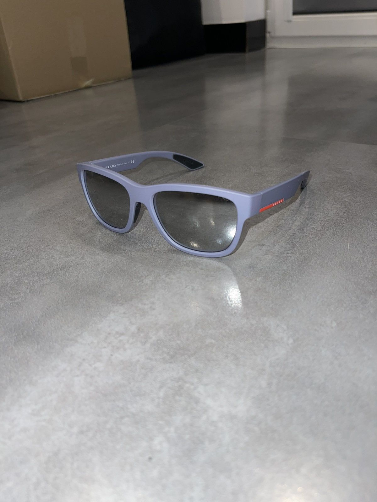 Prada Prada SPS 03Q K3E-2B0 Red Tab Baby Blue Sunglasses Size ONE SIZE - 1 Thumbnail