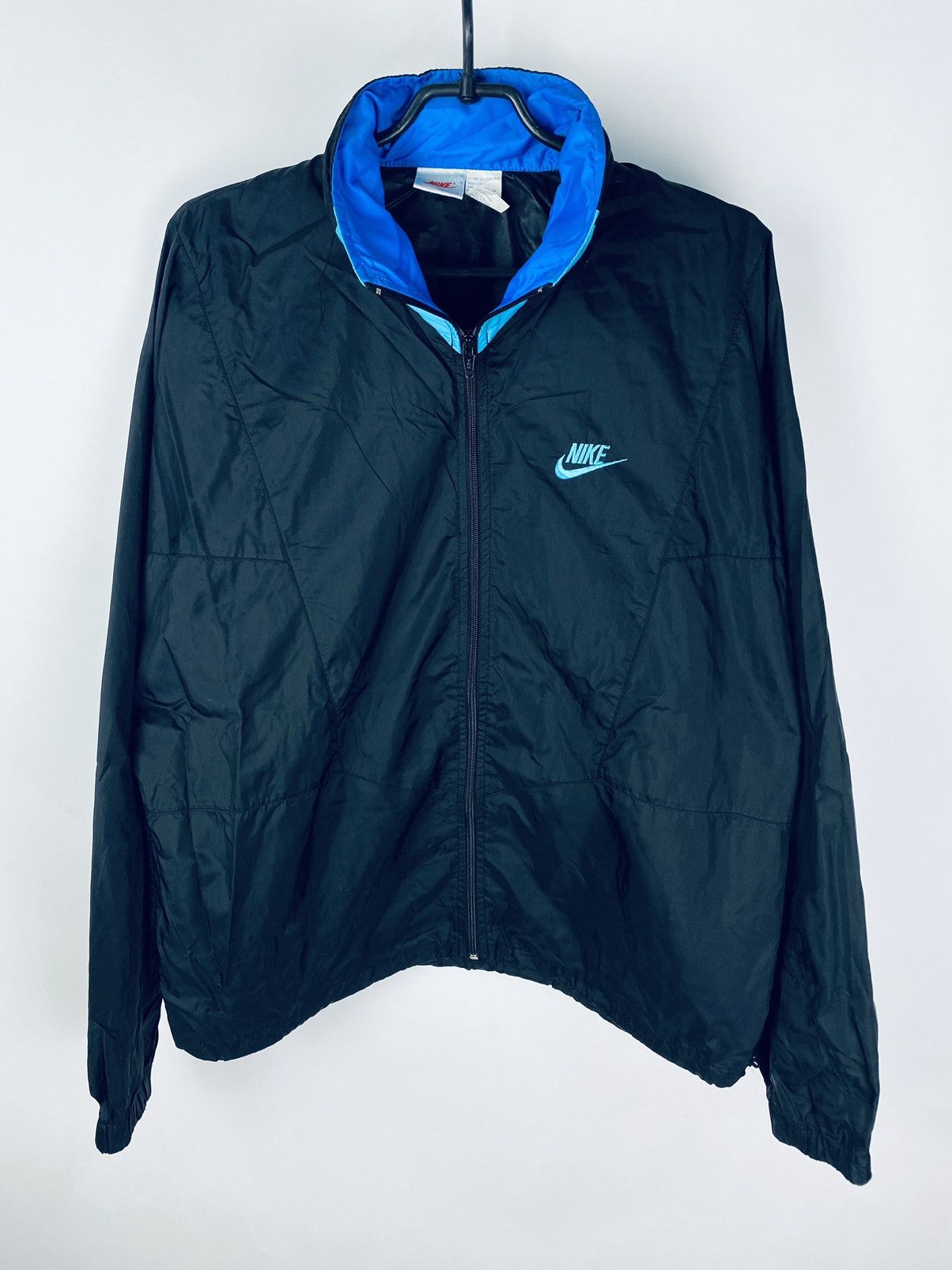 Turquoise nike windbreaker sale