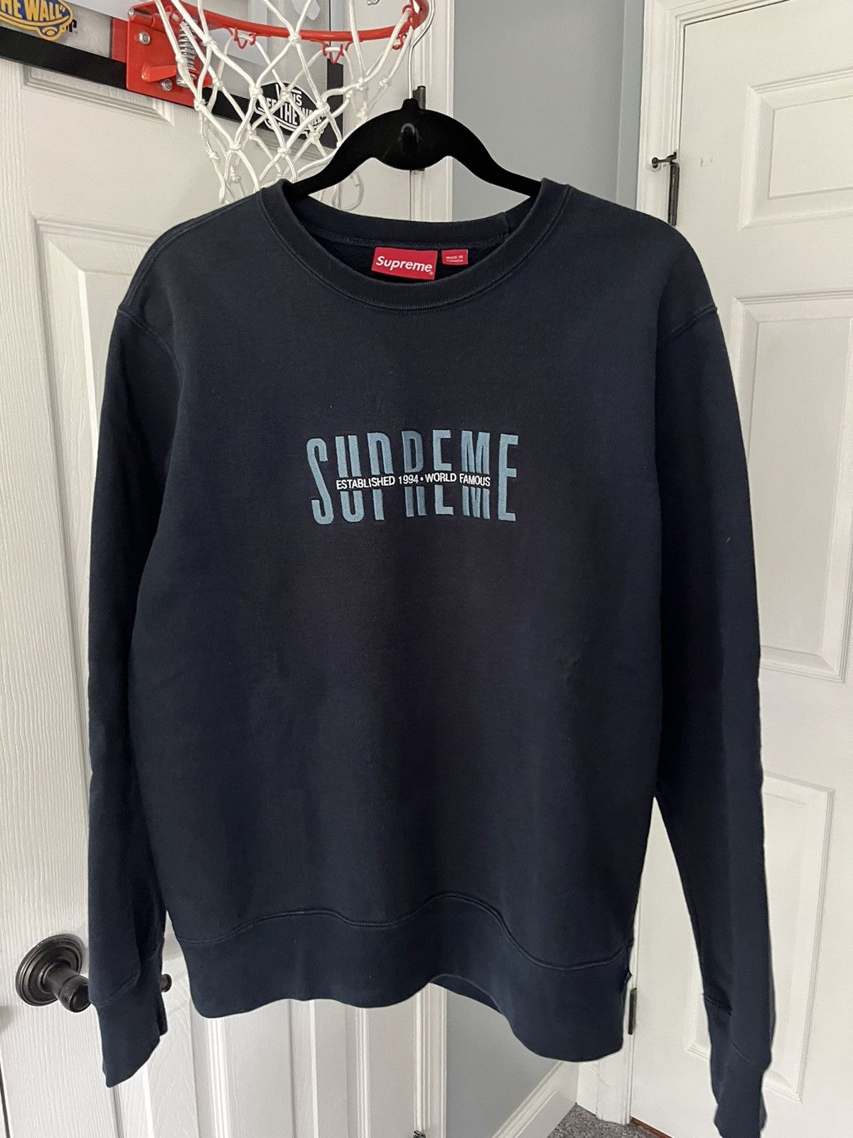 Supreme crewneck clearance world famous