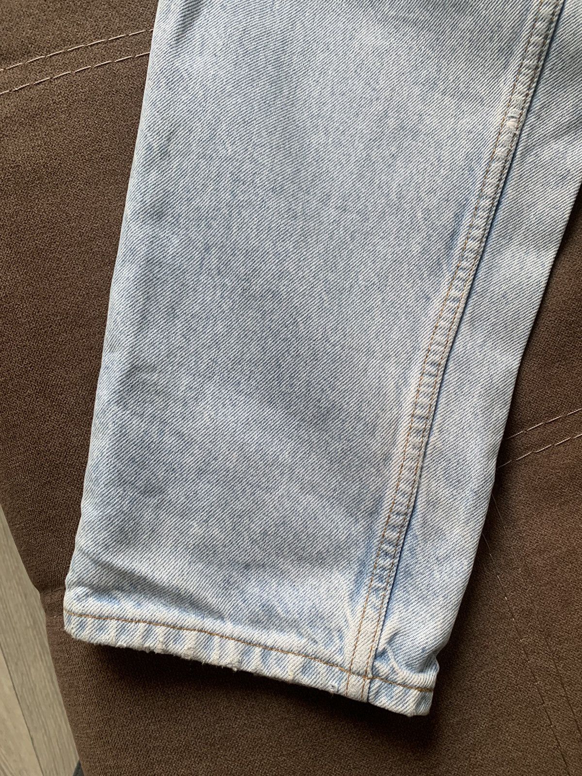 Vintage Levi’s 550 Distressed Relaxed Fit Light Wash Denim Menswear