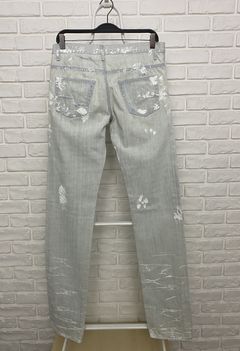 Dior best sale ripped jeans