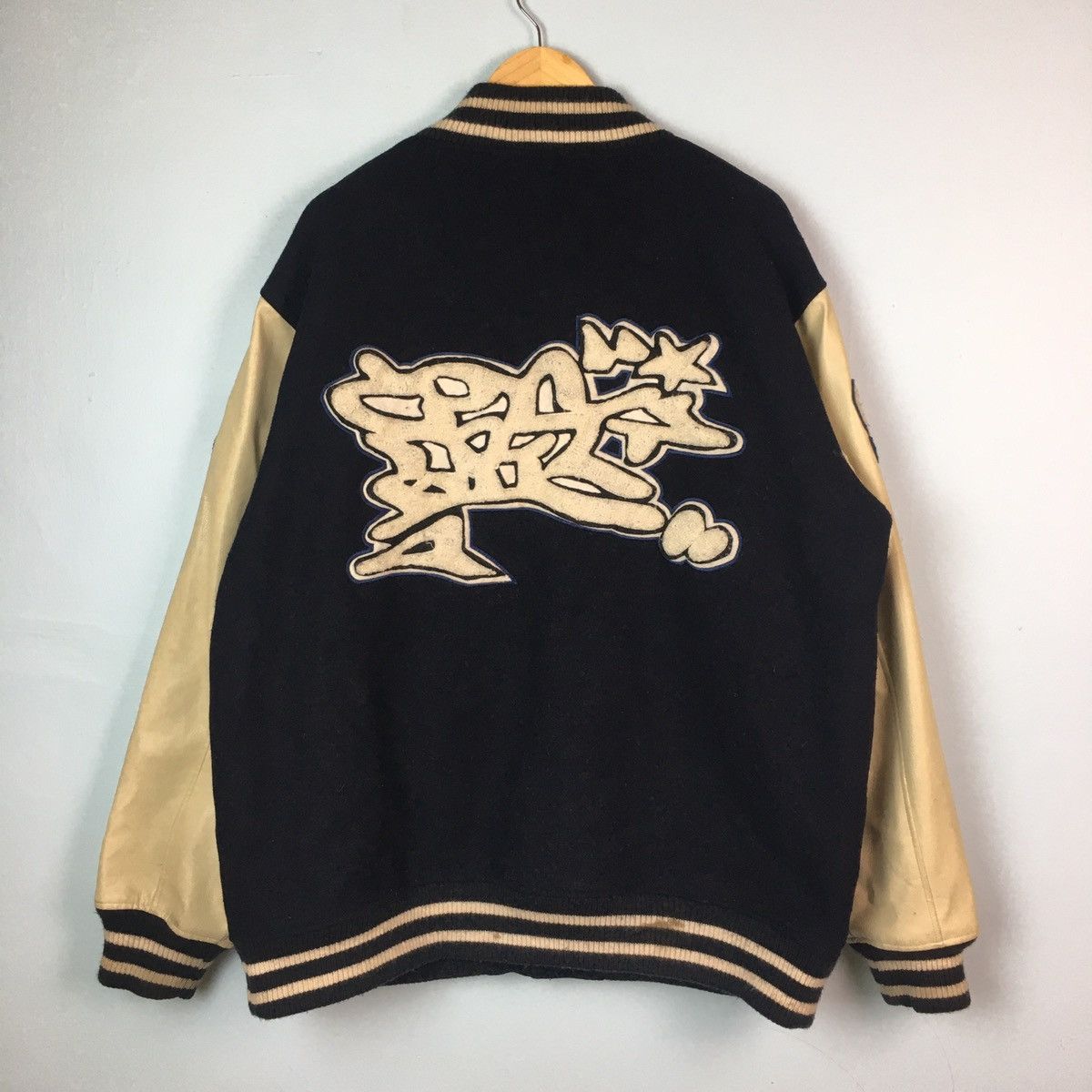 image of La x Varsity Jacket Conart Crew Embossed Graffiti Wool Varsity in Navy Blue, Men's (Size XL)