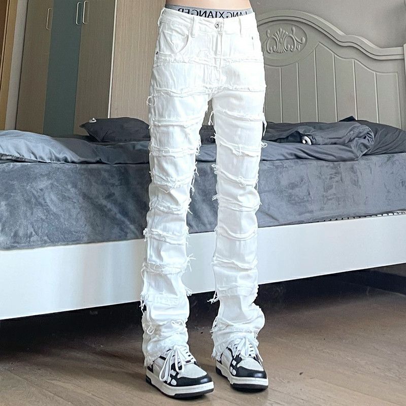 damaged faded distressed punk jeans