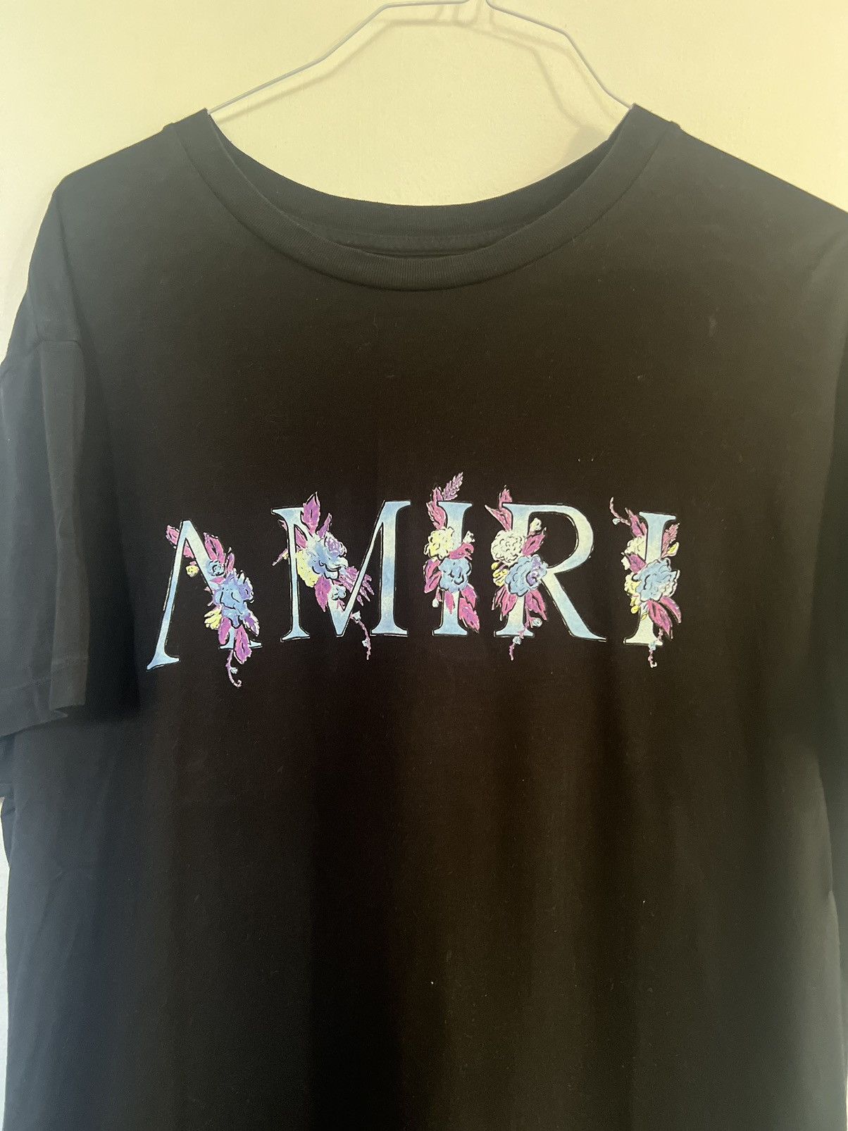 Amiri flowers Logo TEE