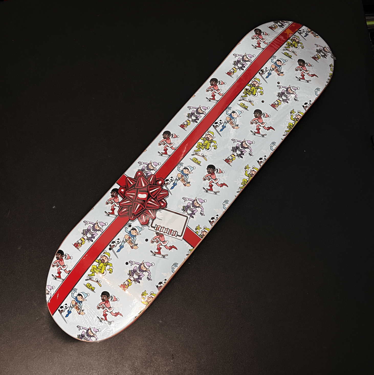 image of Strangelove Skateboards Sean Cliver Holiday Gift Deck Strangelove Skateboard Deck in Blue, Men's