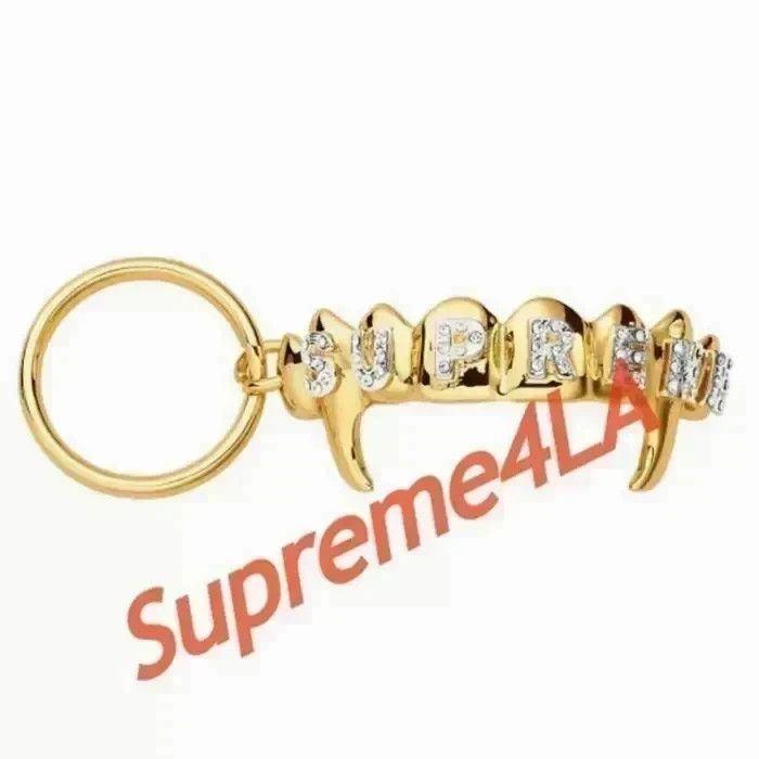Supreme keychain gold clearance